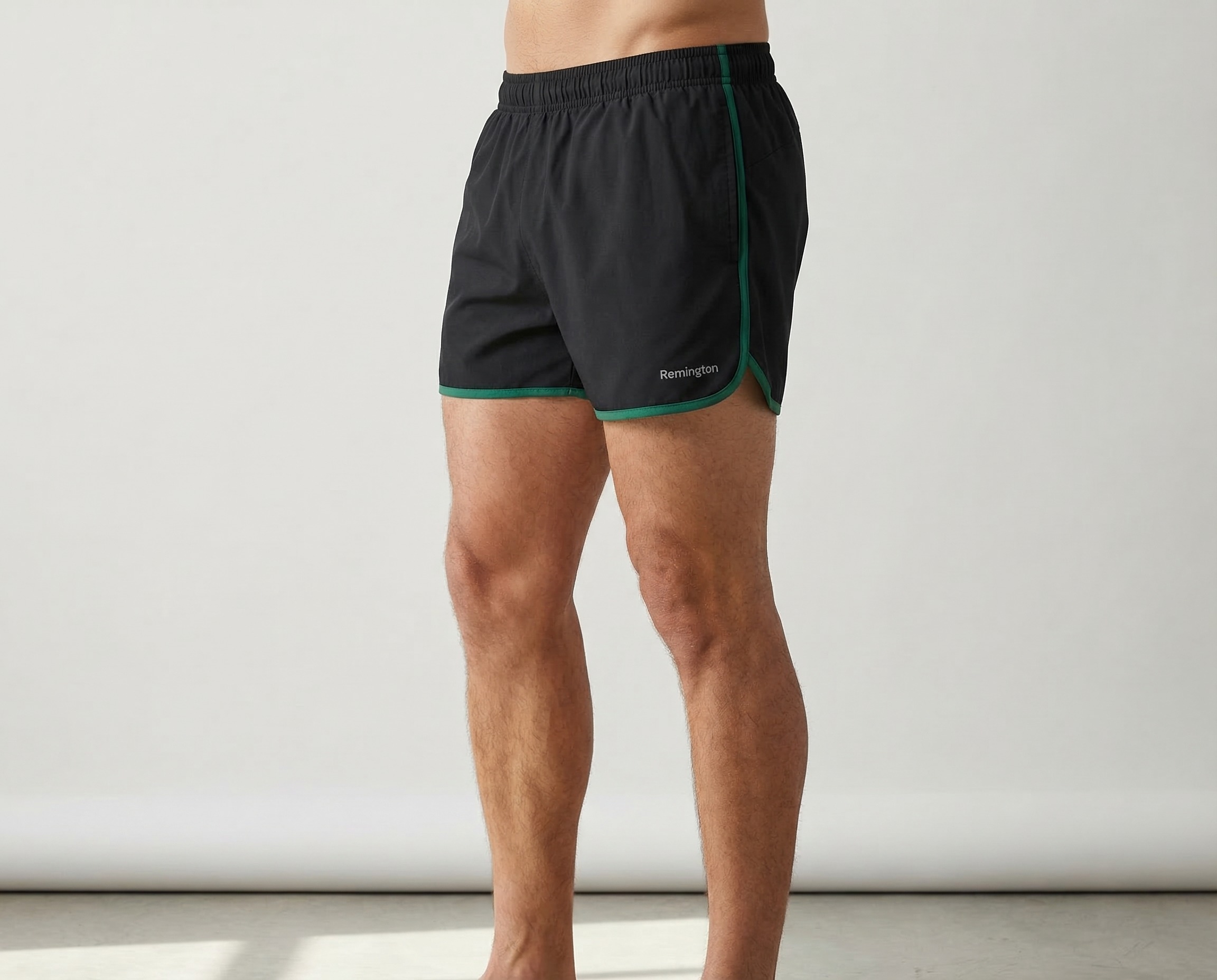 SprintEdge men’s black running shorts with green contrast binding front view