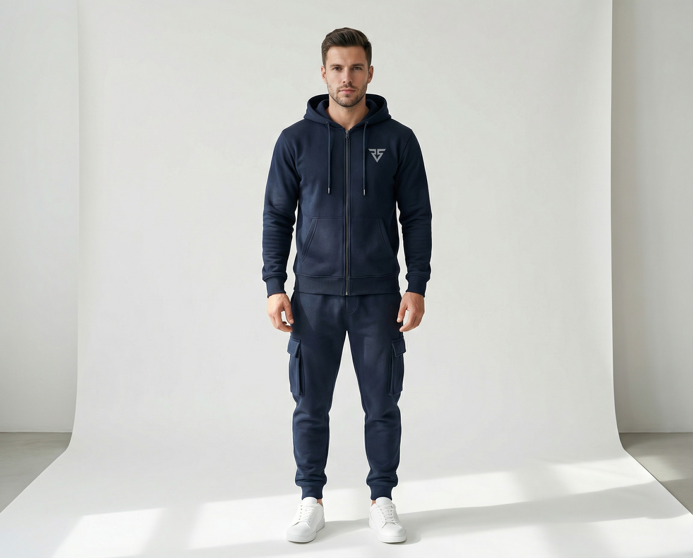 Men's navy cargo fleece tracksuit with full-zip hooded jacket, ribbed cuffs and matching tapered joggers