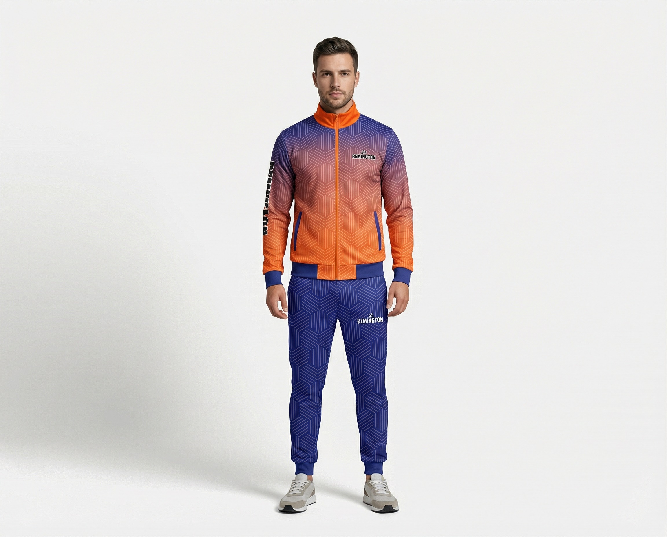 Men's geometric sublimated tracksuit featuring a blue-to-orange full-zip jacket, stand-up collar and matching blue printed joggers