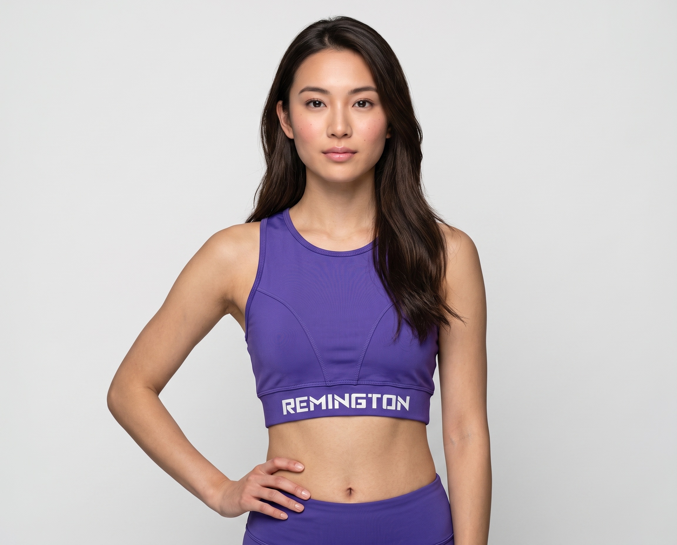 CoreFlex women’s violet purple racerback sports bra with branded supportive underband.