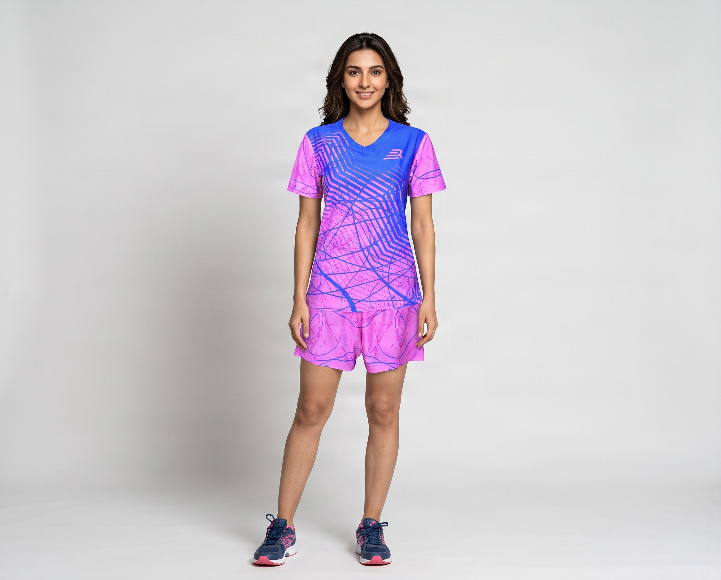 Women’s custom sublimated football uniform with matching jersey and shorts