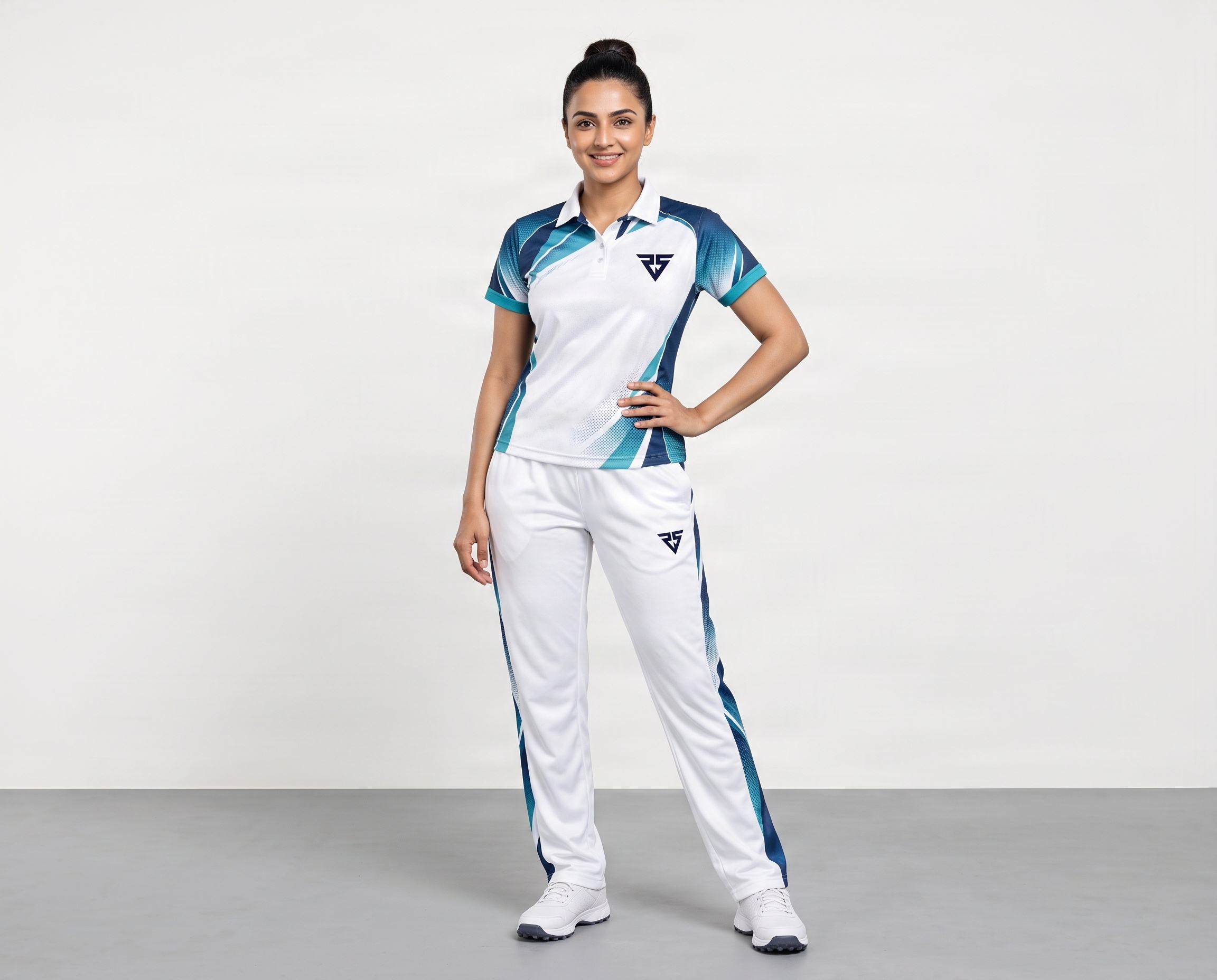 Custom women’s cricket uniform with sublimated polo shirt and matching trousers