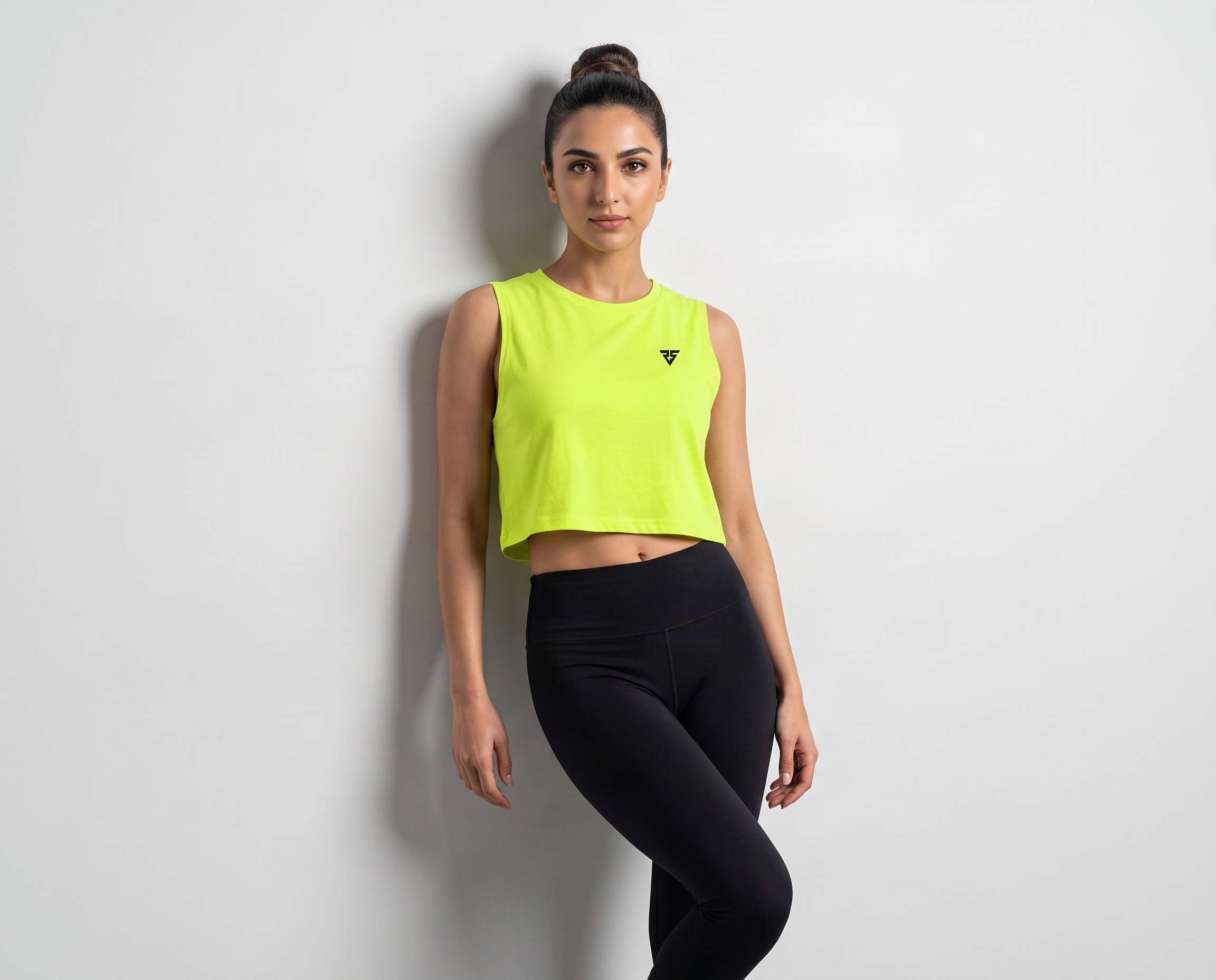 Front view of fluorescent lime women’s cropped sleeveless training tank top