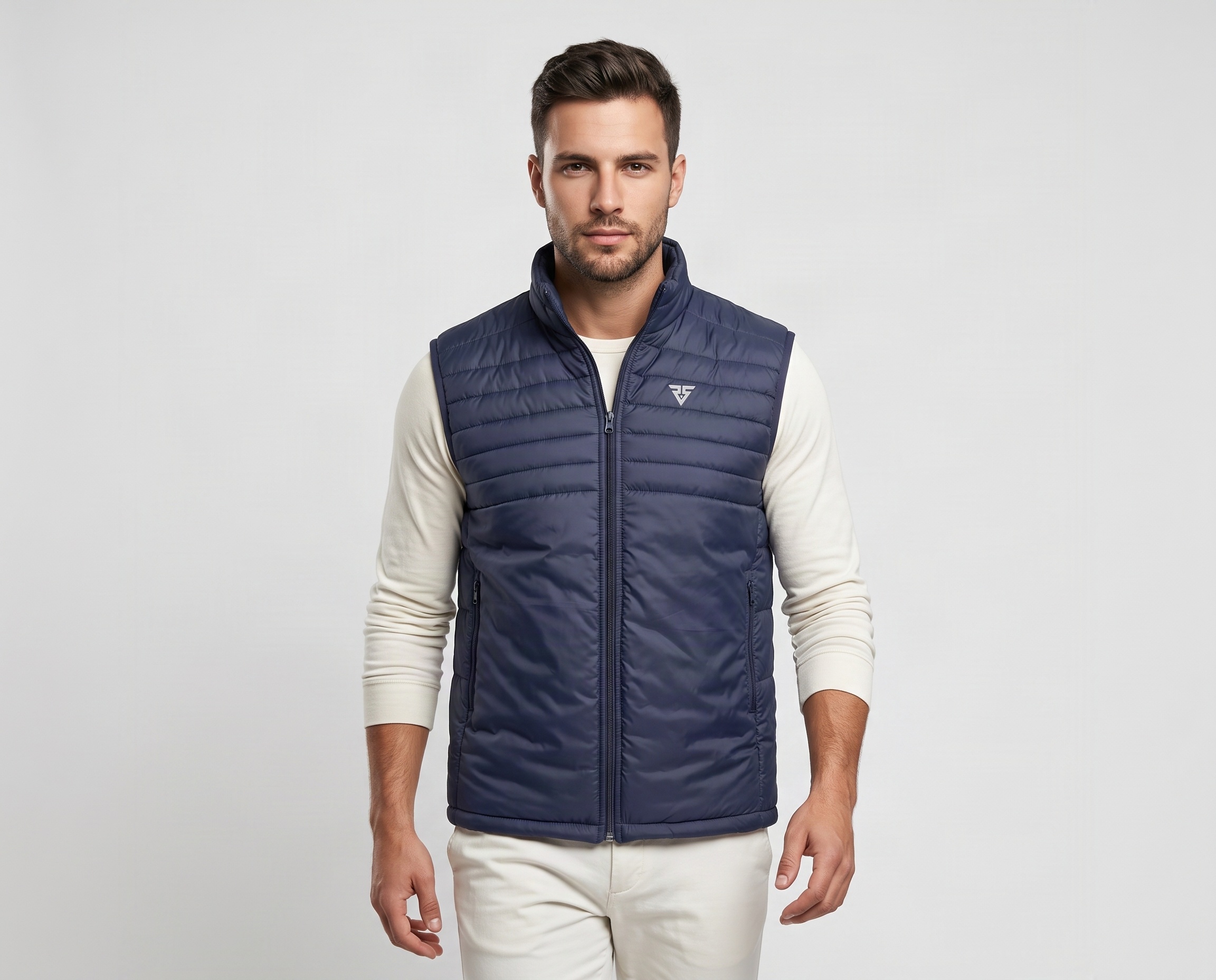 Men’s navy blue quilted puffer vest with full front zipper, stand-up collar and chest logo
