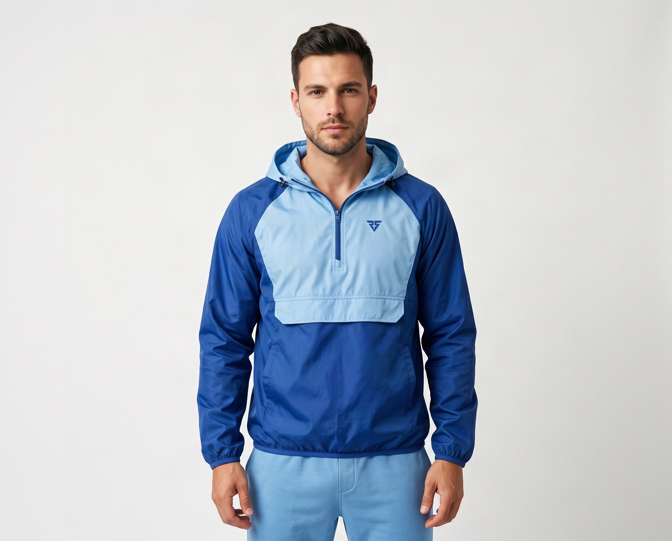 Men’s royal blue half-zip hooded windbreaker with sky-blue chest panel and elasticated cuffs