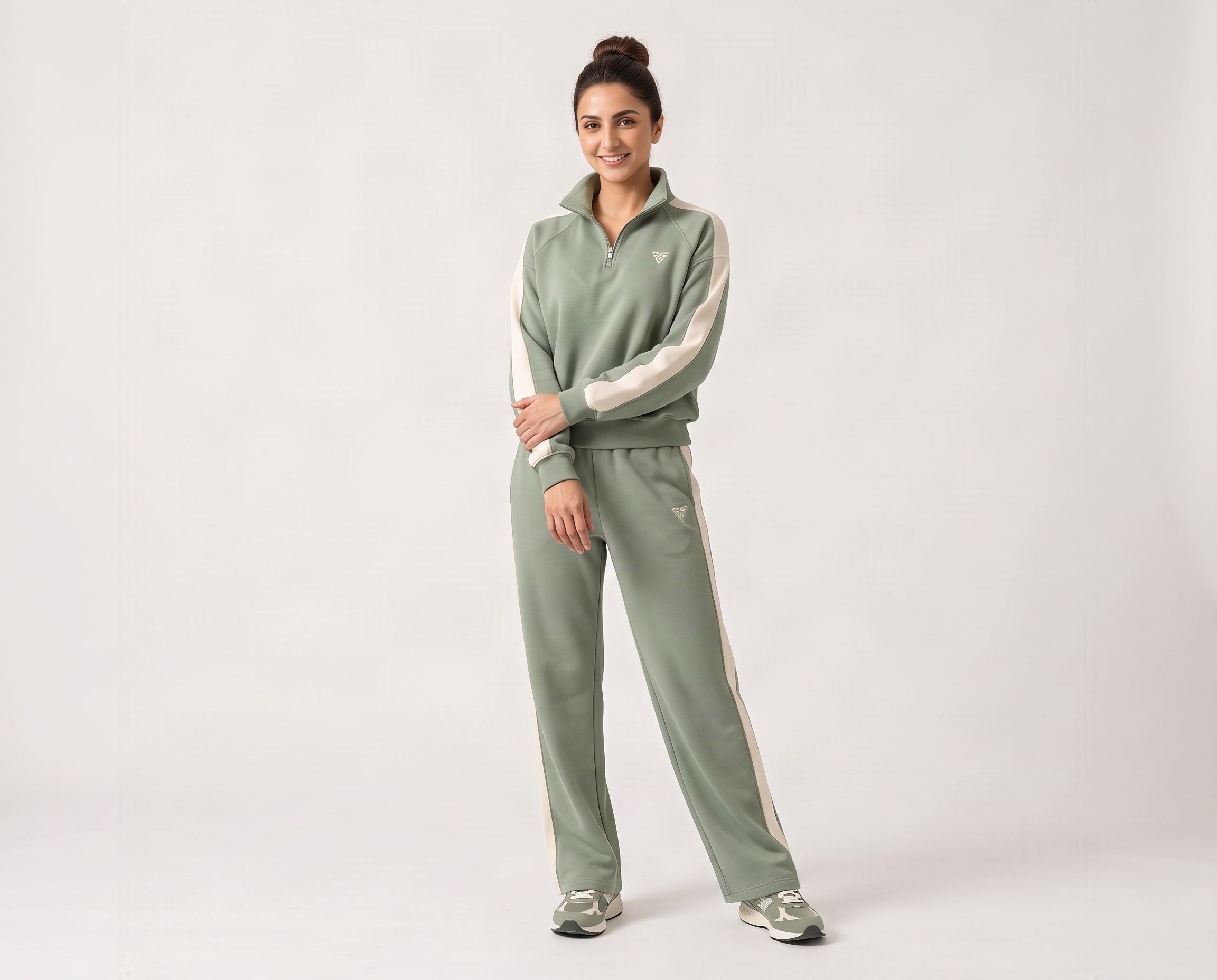 Front view of women's sage-green quarter-zip lounge set with ribbed cuffs, ivory stripes and relaxed pants