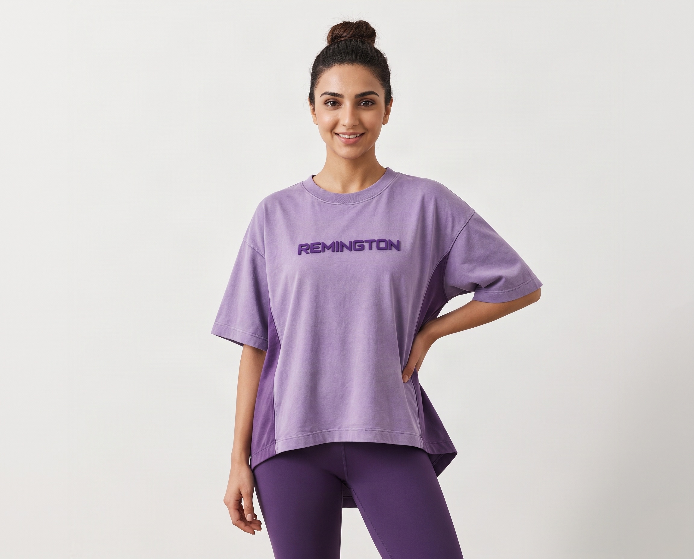 Front view of women's lavender oversized T-shirt with deep-purple REMINGTON logo and contrasting side panels