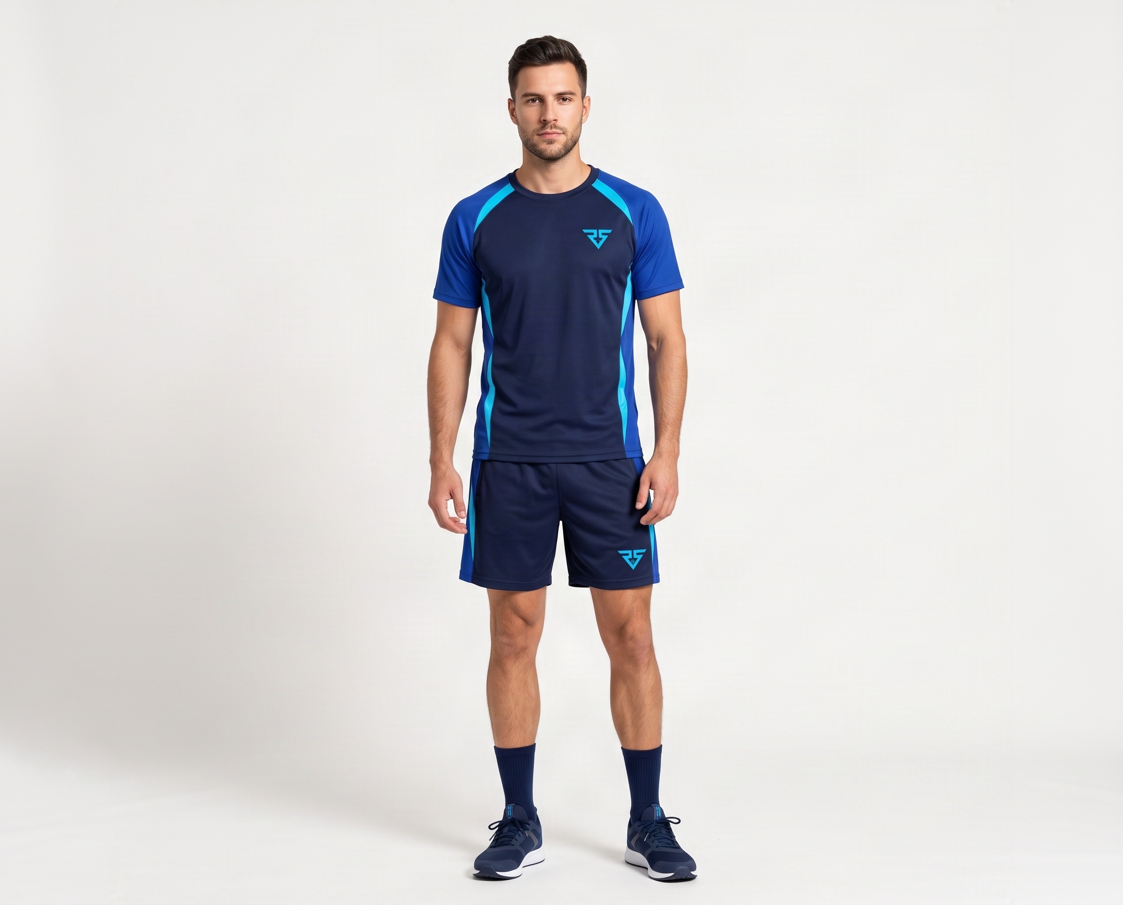Men's navy-blue cut-and-sew padel uniform with royal-blue sleeves, cyan contrast panels and matching shorts