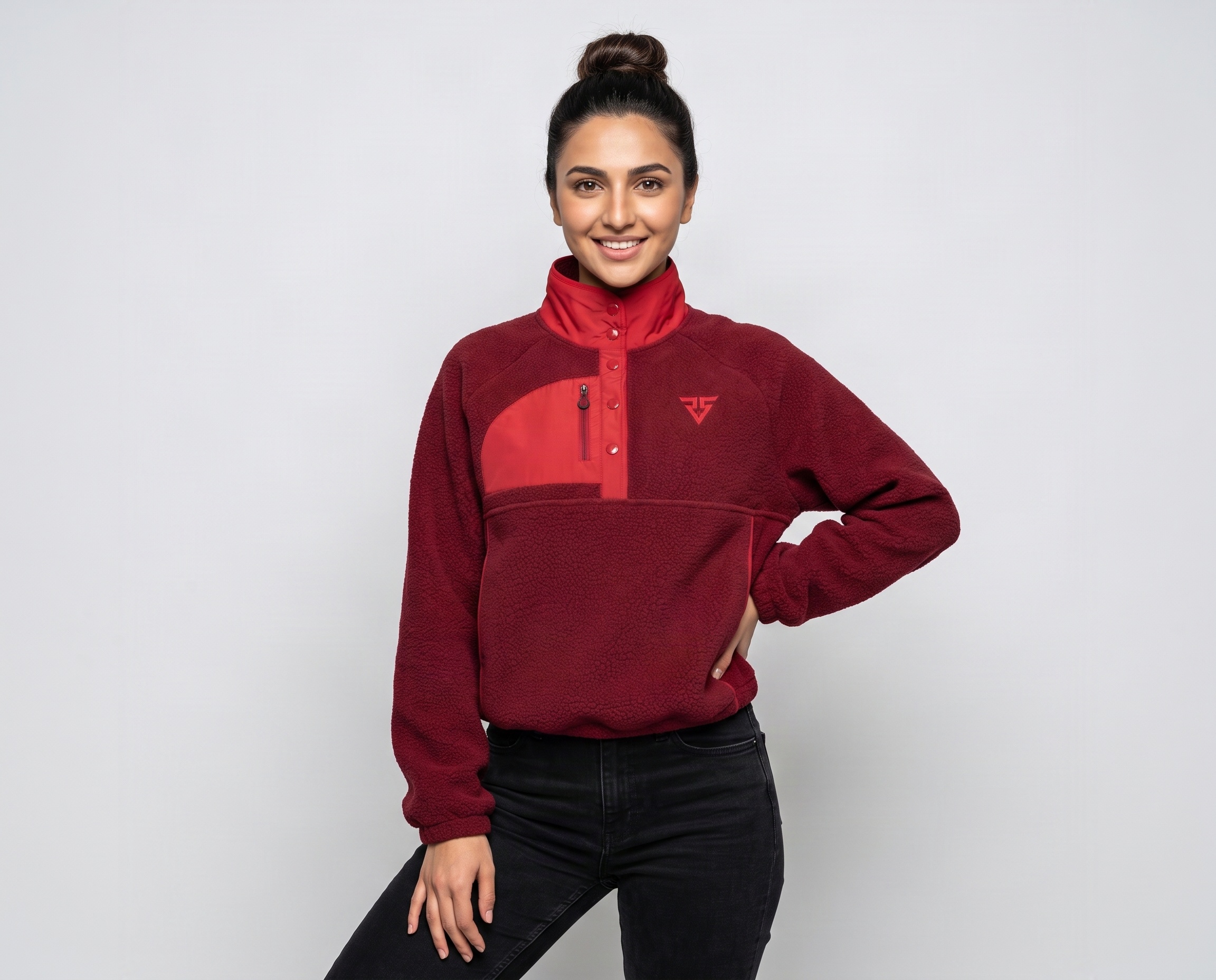 Women's burgundy sherpa fleece pullover jacket with red contrast chest panel, snap-button collar and zippered chest pocket