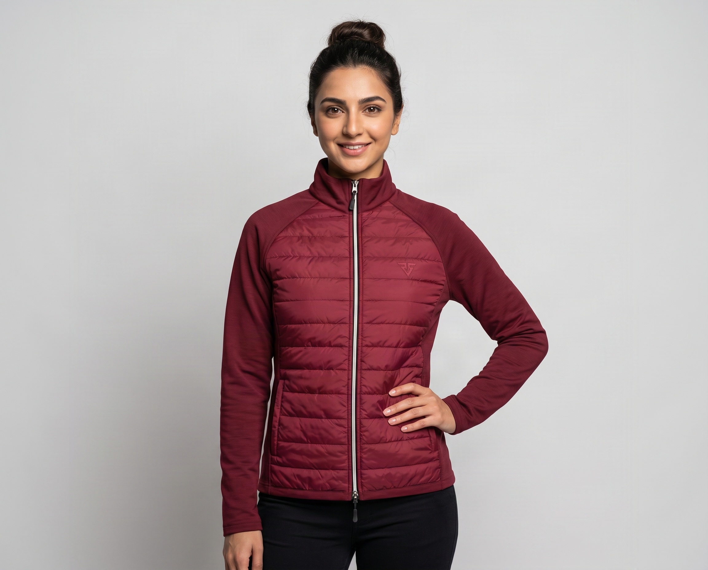 Front view of women's burgundy hybrid quilted jacket with full-length zipper, high collar and tonal RS logo