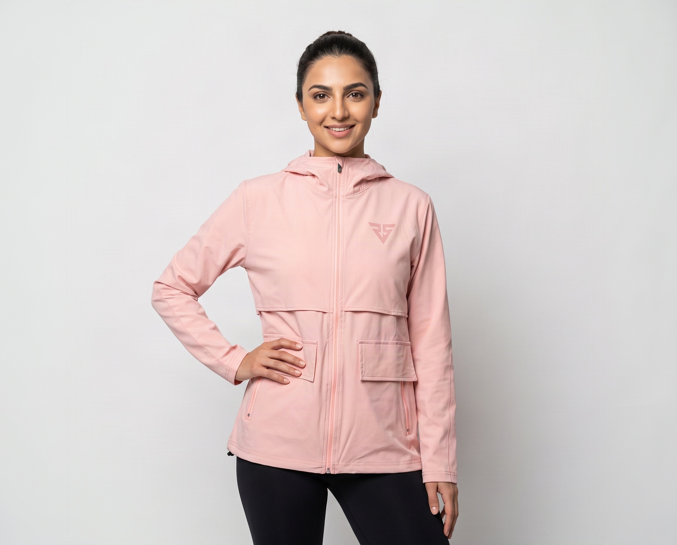 Front view of women's blush-pink full-zip hooded jacket with utility flap pockets and tonal chest logo